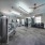 spacious gym with ceiling fans throughout